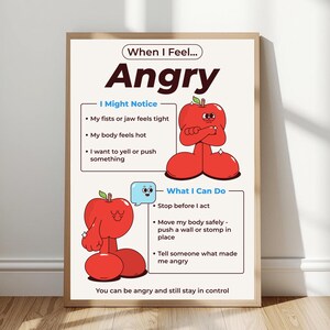 May include: A framed educational poster titled When I Feel Angry featuring two red apple characters. The text lists physical signs of anger and coping strategies, including stop before I act, move my body safely, and tell someone what made me angry.