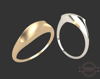 May include: Two simple wedding bands, one gold and one silver, with a rounded, slightly curved design.