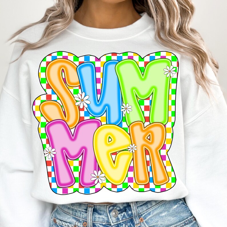 May include: White sweatshirt with a colorful "SUMMER" graphic in a checkered pattern. The letters are outlined in black and have a 3D effect.