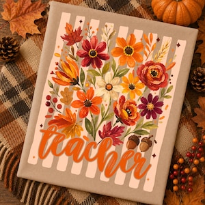 May include: A rectangular beige fabric item featuring a vertical striped pattern and a central floral arrangement of orange, red, yellow, and white flowers with green leaves and two acorns. The word teacher is printed in orange cursive script.