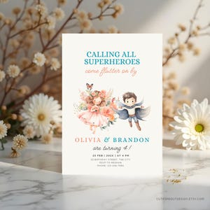 May include: A birthday invitation with the text "CALLING ALL SUPERHEROES" and "OLIVIA & BRANDON are turning 4!". The invitation features watercolour illustrations of a girl and boy dressed as superheroes, with floral accents. The invitation is on a white background.