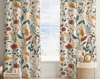 May include: A pair of cream-colored curtains with a floral pattern featuring red, orange, and yellow flowers and green leaves. The curtains are hung in a room with a window and a wicker basket labeled "Toys" with stuffed animals inside.