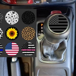 May include: A set of three ceramic mugs with a speckled, matte finish. The mugs are in shades of cream, light gray, and dark gray. Each mug has a simple, minimalist design, perfect for coffee or tea.