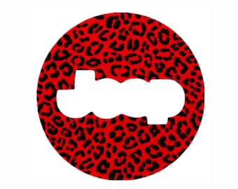 May include: A red circle with a black leopard print pattern. The word "Joop" is cut out of the center of the circle in white.