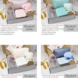 May include: Four gift boxes with different coloured bouquets. Each box contains a glass cup with a straw, a vegan leather cosmetic bag, a bear towel, a travel jewellery box, and a compact mirror. The bouquets are pink, teal, white, and blue.
