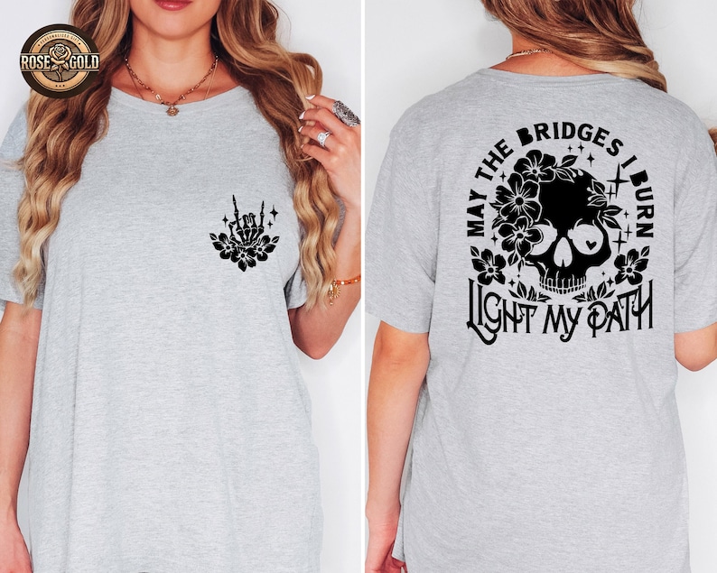 Camiseta con estampado floral de calavera y esqueleto, diseño moderno en la parte delantera y trasera. imagen 2