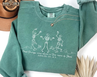 Sudadera Comfort Colors® con esqueleto bailando cristiano, suéter con versículo bíblico "Los muertos cobran vida", regalo cristiano para amantes de Jesús.
