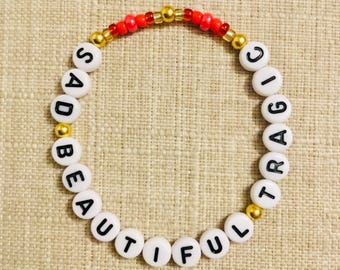 Sad Beautiful Tragic / Red Taylor Swift Friendship and Charm Bracelets (Adults & Kids)