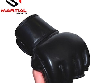 May include: Black MMA-style glove with a padded design. The glove is made of a shiny material and features a wrist strap. The logo "MARTIAL SPORTS" is visible in the upper left corner.