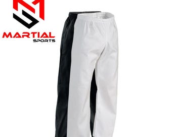 May include: Black and white martial arts pants. The pants are made of a lightweight material and have an elastic waistband. The logo "MARTIAL SPORTS" is visible in the upper left corner.