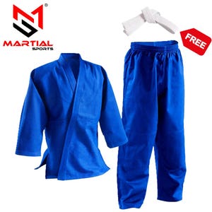 May include: A blue martial arts uniform set, comprising a jacket, trousers, and a white belt. The uniform is made from a robust fabric, suitable for training and competition. A red tag with the word "FREE" is also visible.