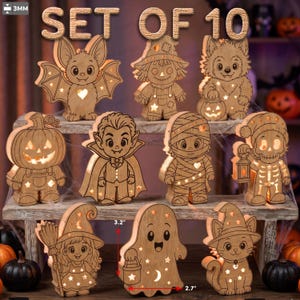 Puede incluir: Un set de 10 decoraciones de Halloween de madera iluminadas que incluyen un murciélago, espantapájaros, hombre lobo, calabaza, vampiro, momia, esqueleto, bruja, fantasma y gato. Cada figura tiene 3mm de grosor y recortes brillantes.
