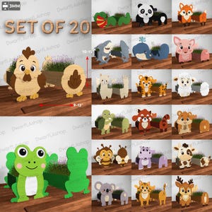 Può includere: Un set di 20 fioriere in legno a forma di animale, ognuna con un design a cartone animato e un vano centrale per le piante. Il set include pollo, panda, volpe, squalo, balena, maiale, lama, tigre, pecora, tartaruga, panda rosso, criceto, ape, ippopotamo, mucca, koala, gatto e cervo, con spessore di 3 mm, lunghezza 23-33 cm e altezza 25-38 cm.