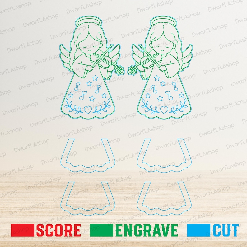 May include: Two teal line art illustrations of angels playing violins, featuring star, musical note, and heart patterns on their dresses. Below the angels are four separate teal outline shapes of dress bases. A legend indicates red for score, green for engrave, and blue for cut.