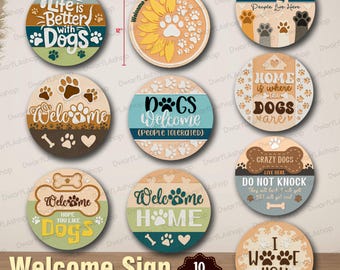 May include: A selection of ten circular wooden welcome signs, each 30.48 cm in diameter, with dog-themed designs. The signs feature phrases such as "Life is Better with Dogs" and "Welcome Home," with paw prints and bone accents. The signs are 3mm thick.