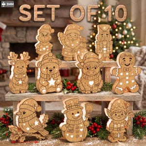 May include: A set of 10 light-up wooden Christmas ornaments featuring laser-cut designs of a reindeer, bear, highland cow, gingerbread man, cardinal, snowman, elf, Santa, nutcracker, and a character, each with cutouts measuring 3.2 inches tall.