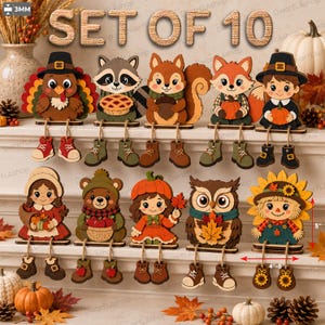 Può includere: Un set di 10 decorazioni in legno da scaffale con personaggi a tema autunnale, tra cui un tacchino, un procione, uno scoiattolo, una volpe, bambini, un orso, un gufo e uno spaventapasseri. Ogni figura ha gambe penzolanti con stivali e misura 12,7 cm.