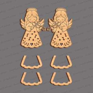 May include: Two light-colored wooden angel cutouts, each playing a violin. The angel dresses feature laser-cut stars, musical notes, and a heart at the hem. Four separate wavy-edged wooden base pieces are included for standing the figures.