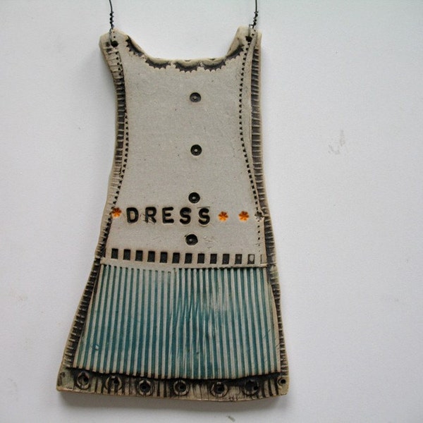 Reserved . . . DRESS 2 plaquette