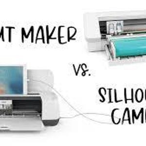 May include: A side-by-side comparison of the Cricut Maker and Silhouette Cameo 4 cutting machines. Both machines are white and feature a cutting mat and a roll of vinyl.