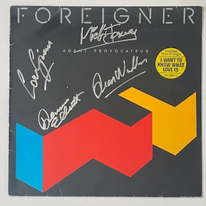 Foreigner Autograph On LP Record  Sleeve With COA