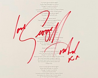 Autógrafo de George Michael en hoja A4 con certificado de autenticidad