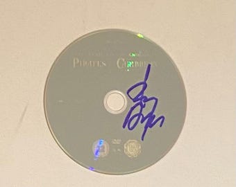 Johnny Depp Pirates Of The Caribbean Autographed DVD With COA