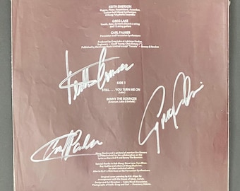 Autografo di Emerson Lake and Palmer su inserto LP con certificato di autenticità