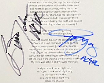 Autografo degli AC/DC su foglio A4 con certificato di autenticità.