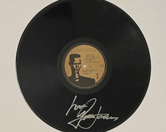 Autografo di Grace Jones su disco in vinile LP con certificato di autenticità
