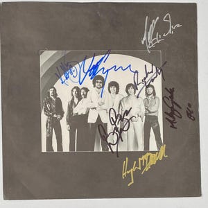 ELO Autograph 7 Band Members on ELO LP Inner Sleeve With coa