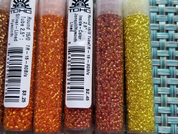11//0 Round TOHO Japan Glass Seed Beads #2-Transparent Lt Topaz 10g