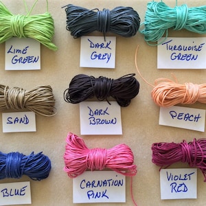 May include: Assortment of 10 spools of waxed cotton cord in various colors, including lime green, dark grey, turquoise green, sand, dark brown, peach, blue, carnation pink, and violet red.