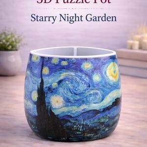 May include: A 3D puzzle pot with a design inspired by Van Gogh's "Starry Night." The pot features a blue and yellow swirling night sky with a dark silhouette of a town and text that reads "Starry Night Garden."