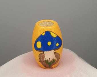 Various crafted and hand painted wooden beads.