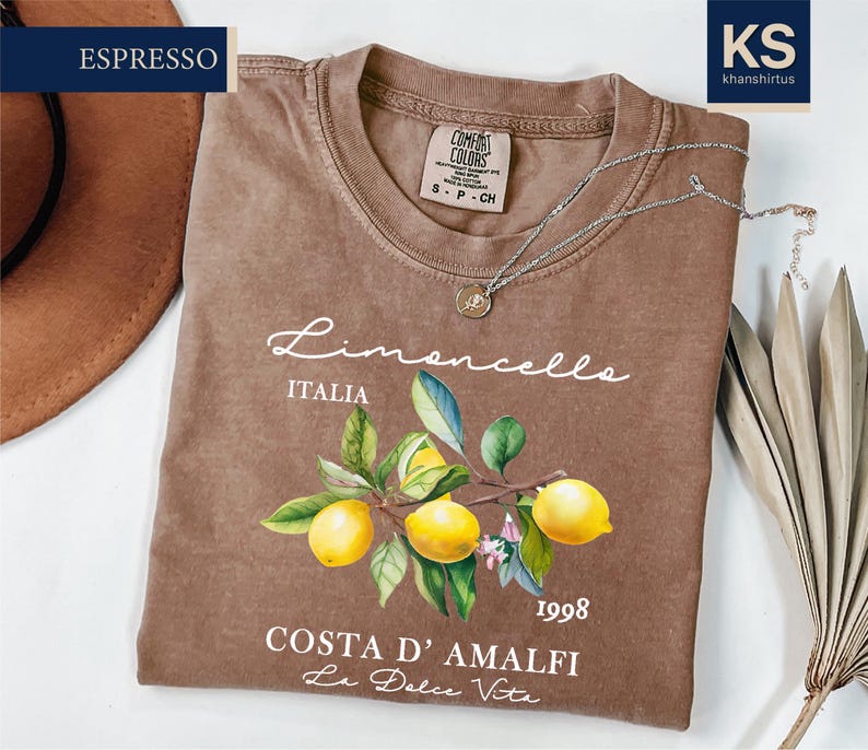a t - shirt with a picture of lemons on it