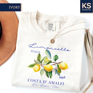 a t - shirt with a picture of lemons on it