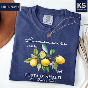 a t - shirt with a picture of lemons on it