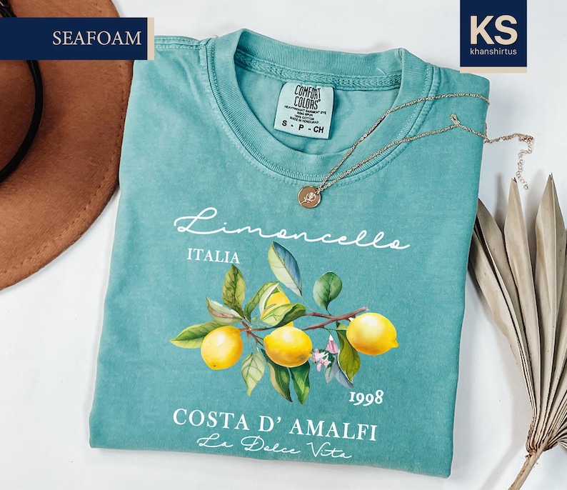 a t - shirt with a picture of lemons on it