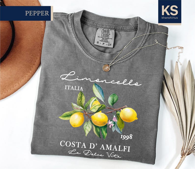 a t - shirt with a picture of lemons on it