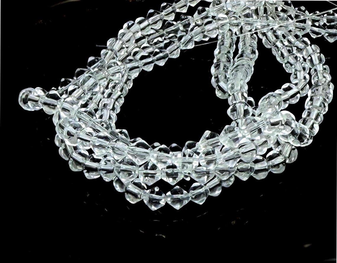 50 Clear Crystal Glass Diamond April Birthstone Bicone Beads 4mm Aurora ...