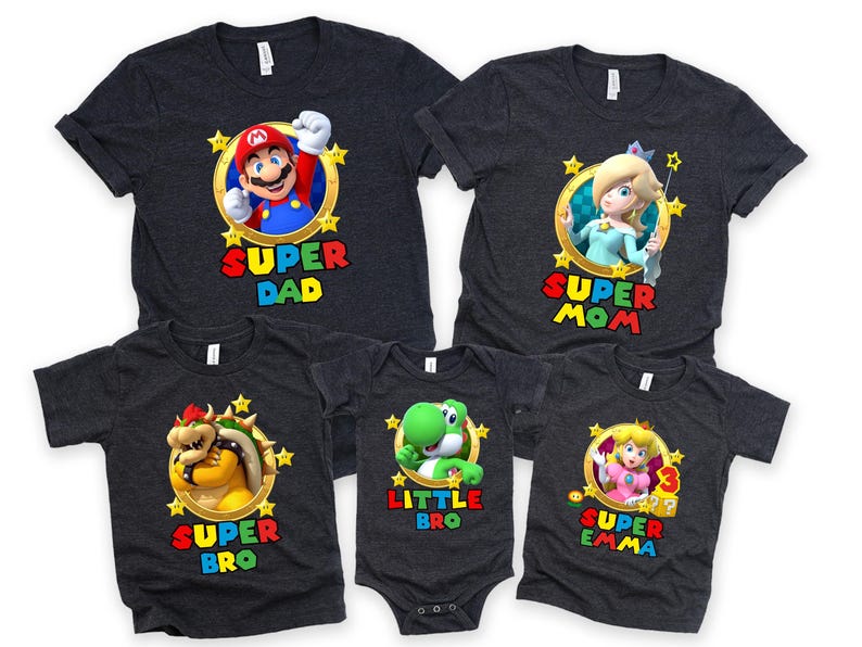 May include: A set of five gray t-shirts featuring characters from the Super Mario Bros. video game franchise. The shirts have different designs and text, including "Super Dad", "Super Mom", "Super Bro", "Little Bro", and "Super Emma".