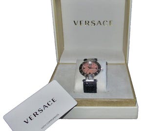 Versace Reve Men's Watch. Model XLQ99. Date Window. Retailed at 1200 Dollars. Personal Collection. Works Perfectly. In Very Good Condition.