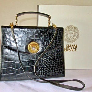 Gianni Versace Embossed Leather Medusa Head Handbag with Detachable Shoulder Strap. Vintage 1990s.Rarely Used. In Excellent Condition.Boxed.