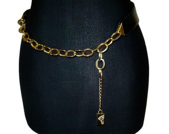 Gianni Versace Gold Medusa Head Chain and Leather Belt. Vintage 1990s. Adjustable Belt fits 28 inches to 31 inches. Excellent Condition.
