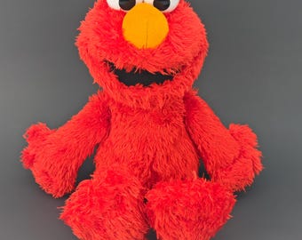 セサミストリート レアなヴィンテージ 楽しいエルモのぬいぐるみ 押す