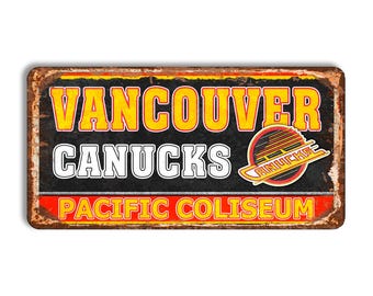 Metalowy znak Vancouver Canucks, znak stadionu Pacific Coliseum