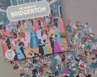 May include: A 1000-piece jigsaw puzzle titled "The World of Bridgerton" with over 30 characters to spot. The puzzle box features a colorful illustration of a ball scene. Scattered puzzle pieces are visible.