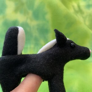 Happy Skunk Finger Puppet