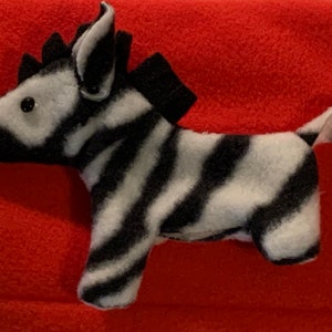 Zebra finger puppet